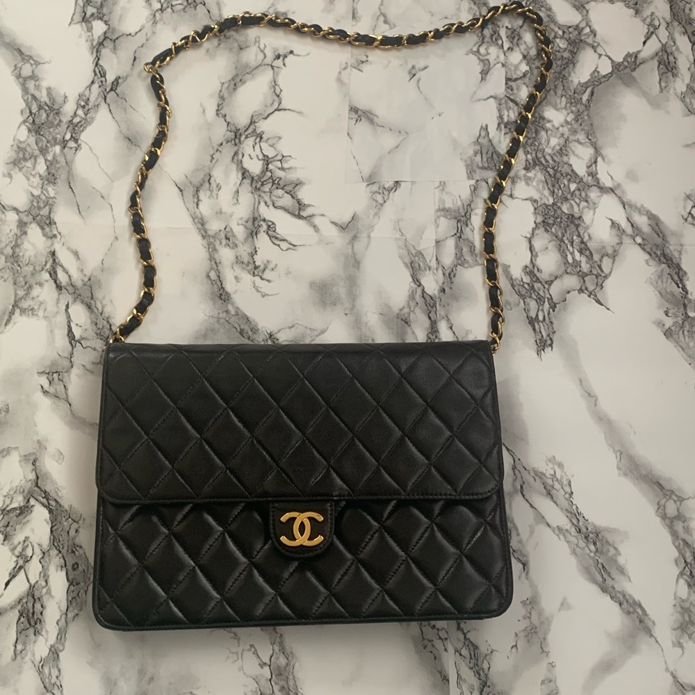 Chanel
 Clutch or Crossbody with Chain Quilted Leather Medium